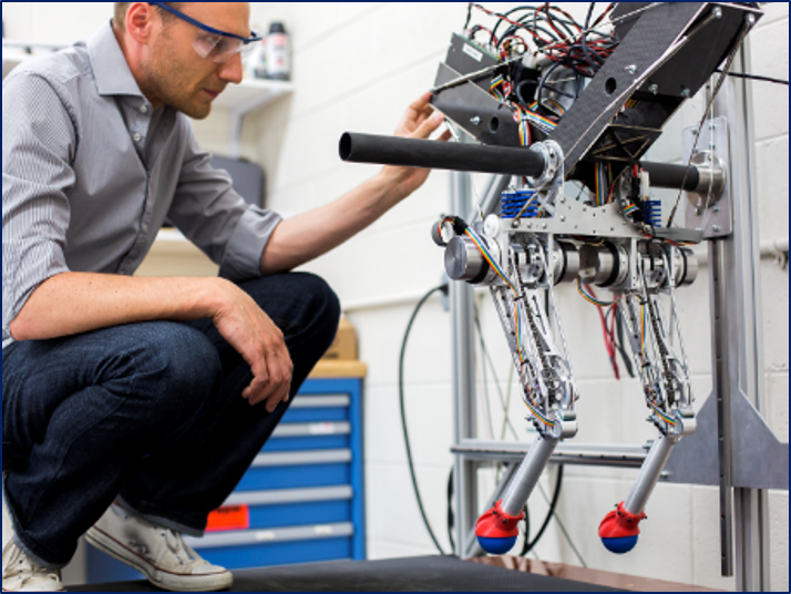 Prof Remy working on a bipedal robot